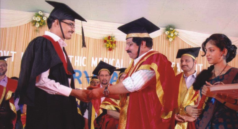 Dr Basil's Recieving certificate in Convocation 